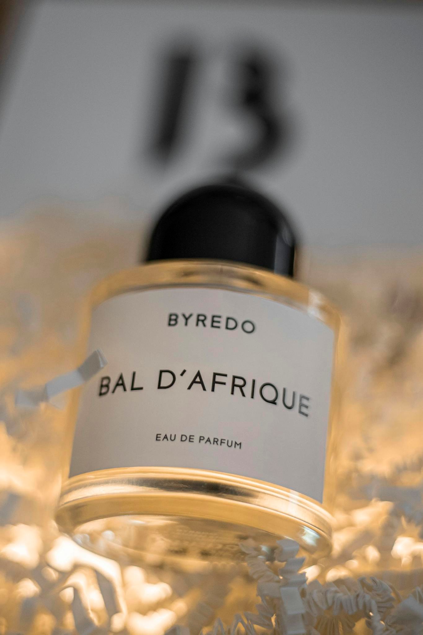 Close-up of Byredo Bal D'Afrique perfume bottle with elegant design.